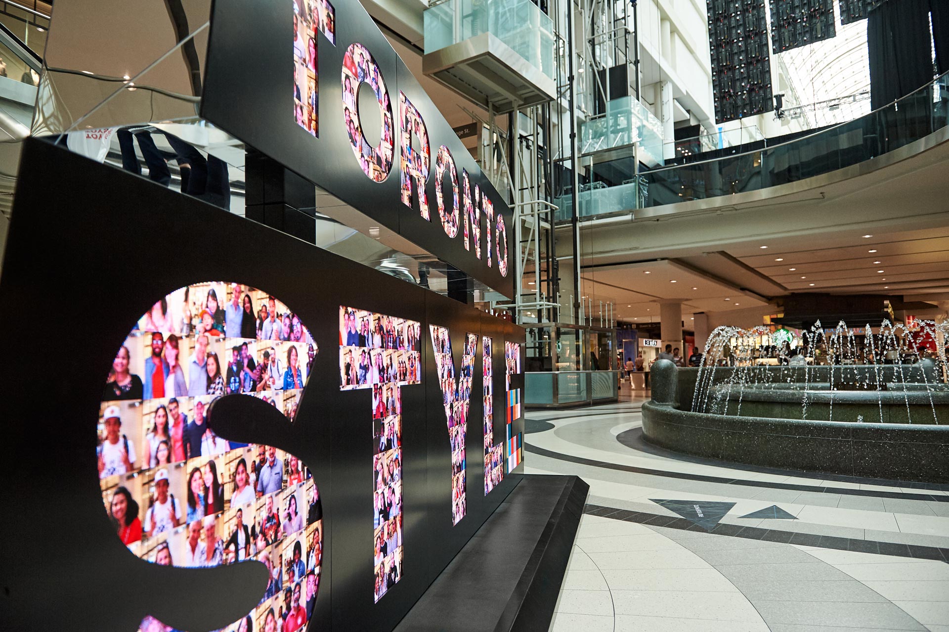 #torontostyle sign fountain in background